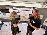 Graduate bresarch assistant Cliff Adamchak , who works in the Hinckley lab, chats about his poster at Rendezvous 2024 - Rendezvous 2024