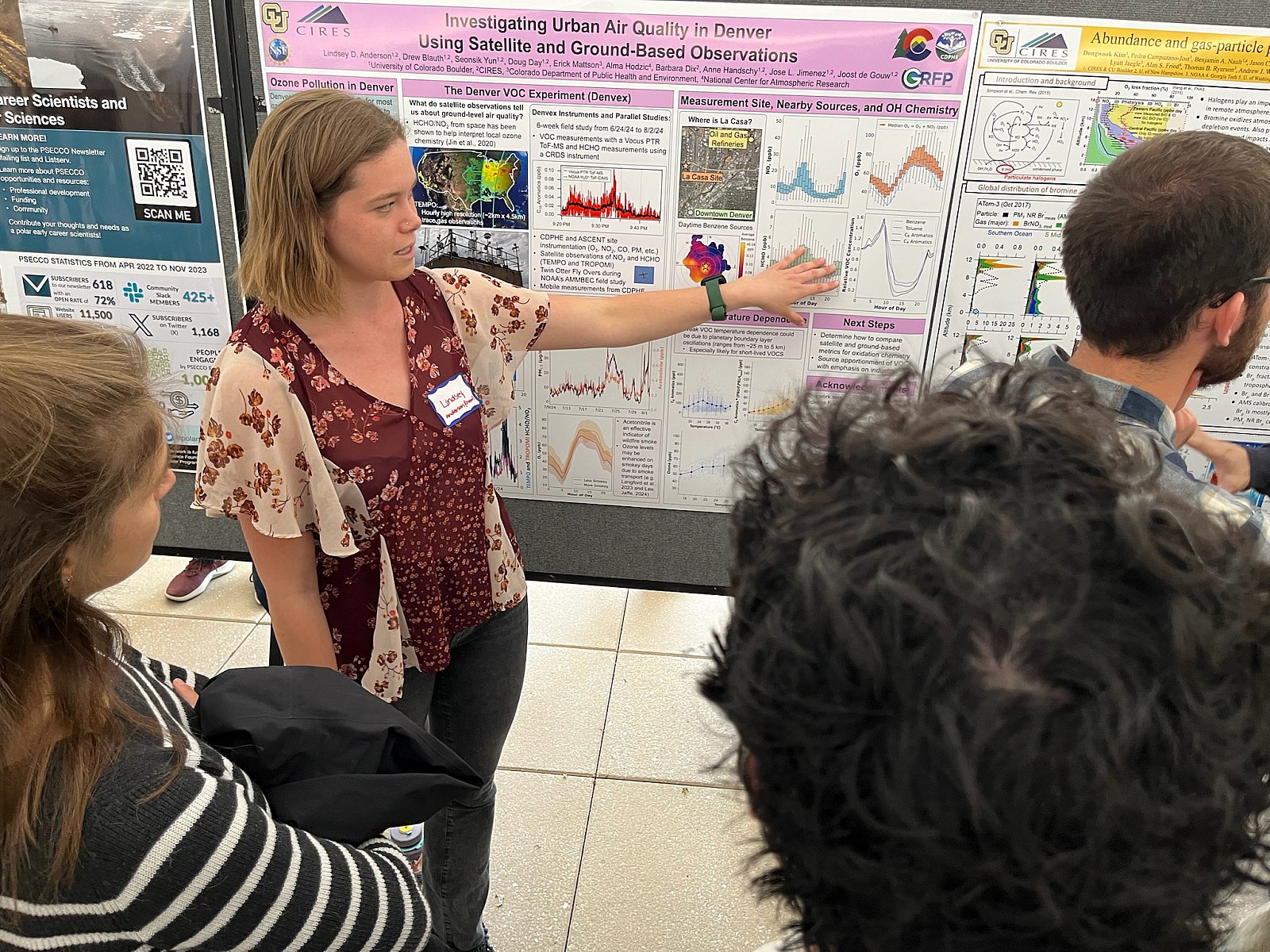 Chemistry graduate student Lindsey Anderson explains a part of her poster at CIRES Rendezvous 2025. - Rendezvous 2025