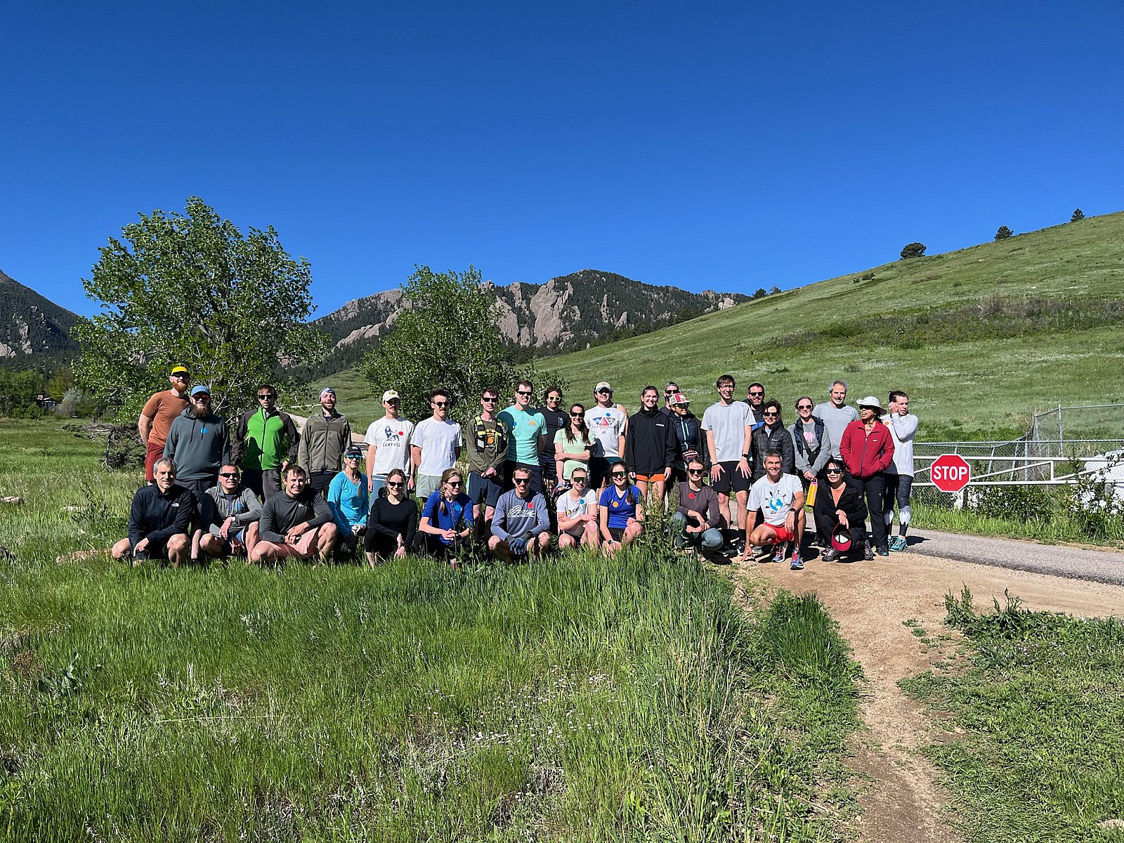 Participants pose at the start of the 2025 CIRES Rundezvous behind the David Skaggs Research Center - Rendezvous 2025